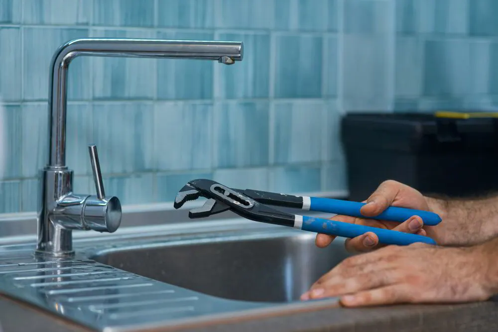 Mineral scale on a kitchen faucet aerator in a Brewster home