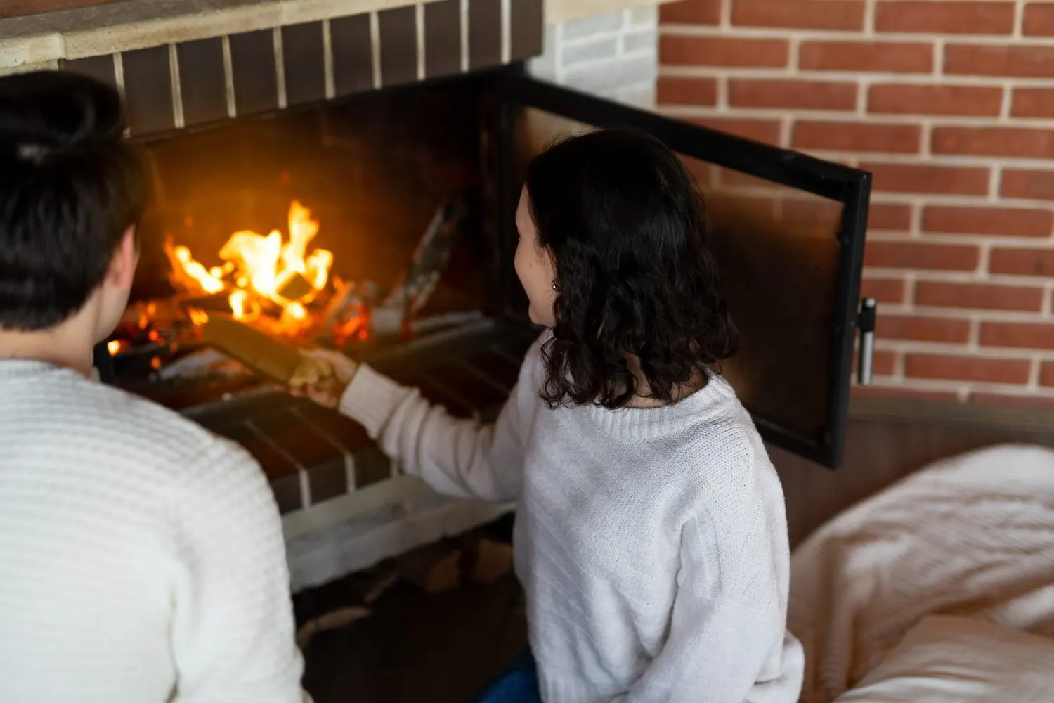 Homeowner and plumber reviewing a gas log layout diagram in Navarre, Ohio