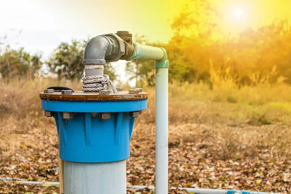 Pressure switch and tank being checked during a pre-purchase well review